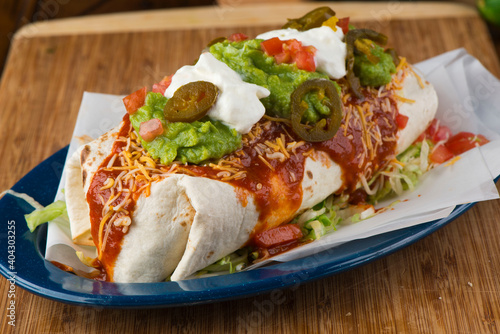 Burritos or tacos. Mexican or Tex-Mex food favorite. Seasoned meat, refried or black beans, Mexican rice, cheese, fried vegetables wrapped in homemade tortillas and served with salsa. Takeout favorite