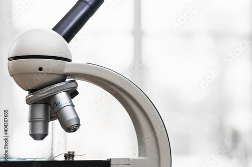 Professional microscope on a workplace in a laboratory