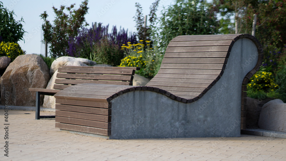 Outdoor Bench made of wood and metal. Open Street bench. Outdoor Bench made of wood and metal. Open Street bench.