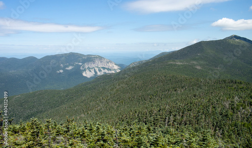Landscape of the White Mountains in New Hampshire, of Cannon Mountain and the Franconia Ridge Trail from Mt. Liberty summit.