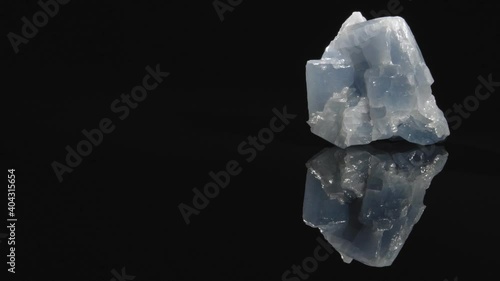 Calcite blue close-up. Black background.