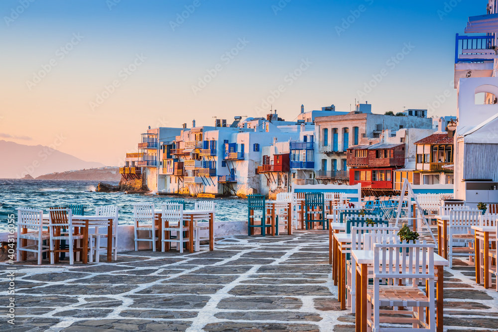 Mykonos, Greece. Waterfront in Little Venice, Mykonos at sunset. - obrazy, fototapety, plakaty 