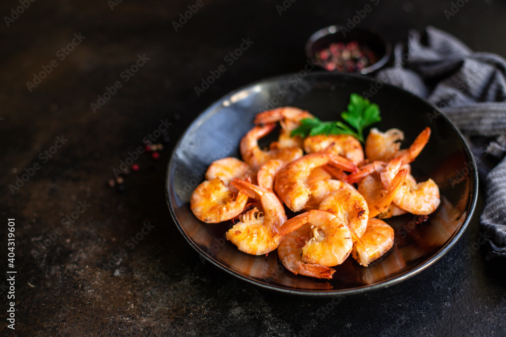 fried shrimps crustacean prawn seafood with spices ready to eat on the table for healthy meal snack outdoor top view copy space for text food background rustic image keto or paleo diet pescetarian