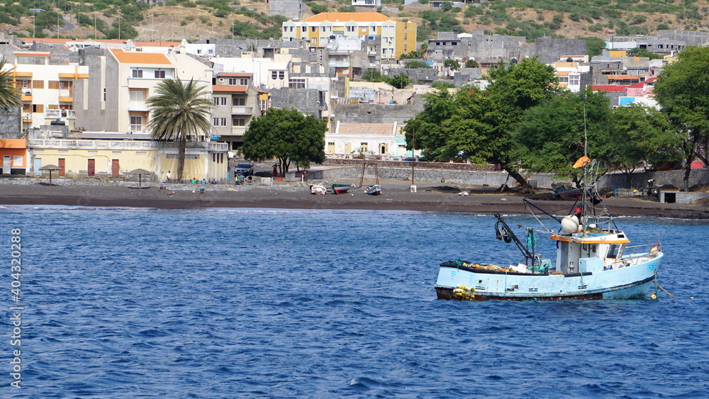 the view of a boat in Porto Novo on the island Santo Antao from a ferry, Cabo Verde, in the month of December