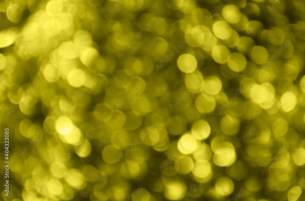 Abstract background with glowing blurred color Illuminating circles. Bokeh in colors of 2021. Glitter vintage lights background. Defocused. Festive new year and Christmas background with yellow lights Abstract background with glowing blurred color Illuminating circles. Bokeh in colors of 2021. Glitter vintage lights background. Defocused. Festive new year and Christmas background with yellow lights