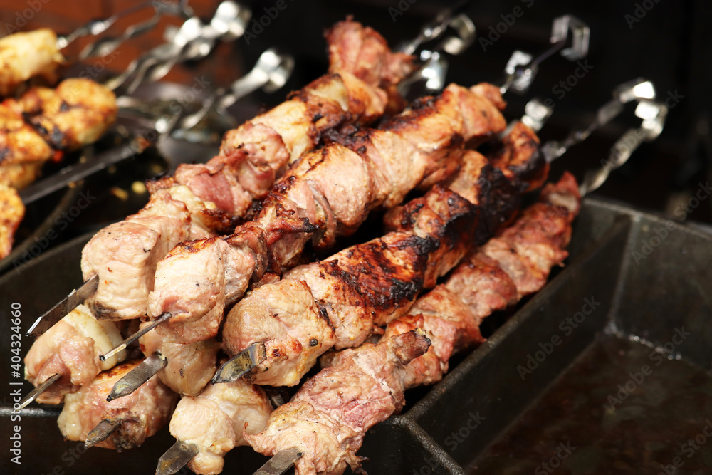 Kebab on the grill, meat cooking on charcoal	