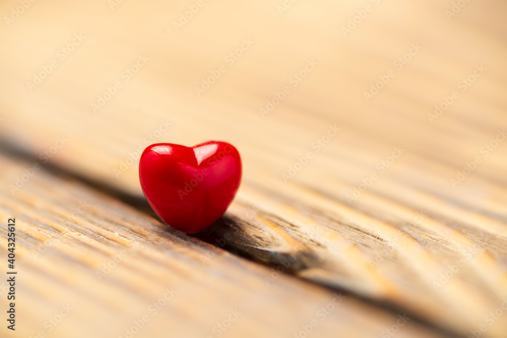 Valentines Day background with hearts. Red heart on old wood. Holidays card with copy space