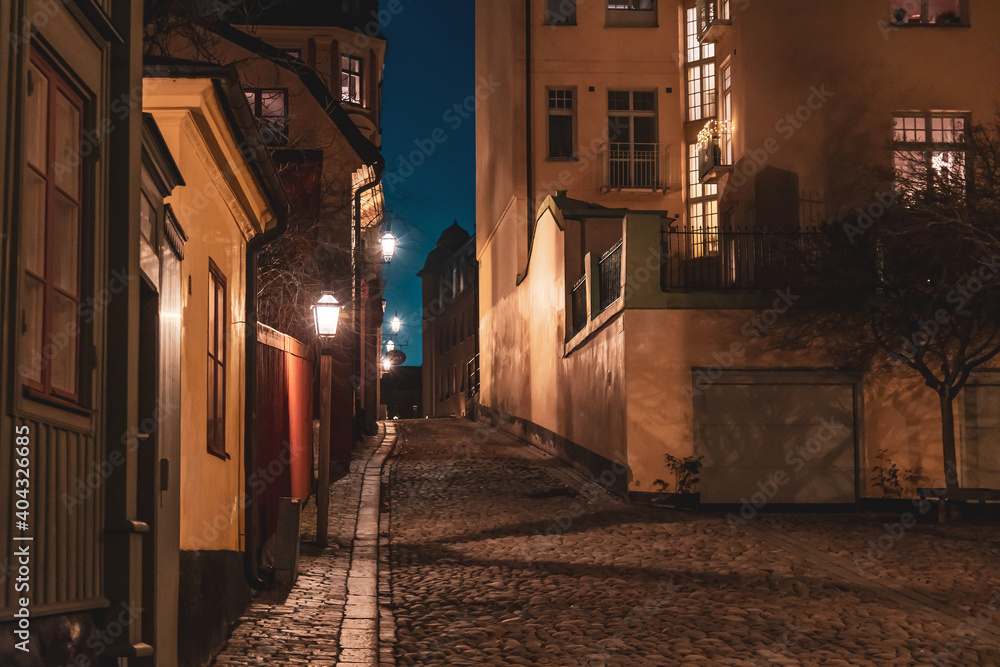 Evening street in Stockholm. Night cityscape in warm colors.