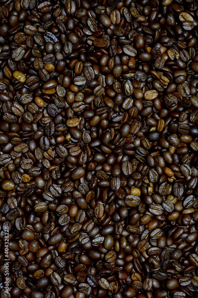 Black coffee. Black coffee beans. Black coffee beans are heaped Black coffee. Black coffee beans. Black coffee beans are heaped