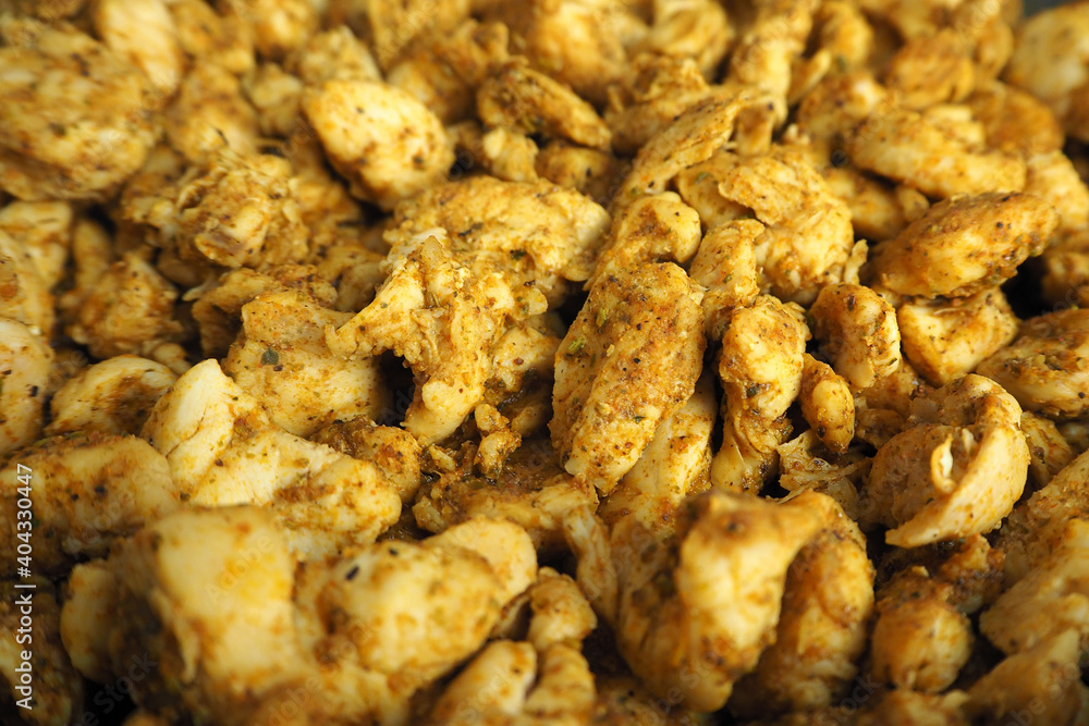closely sliced fried chicken breast in different spices kebab side view . food prepared at home closely sliced fried chicken breast in different spices kebab side view . food prepared at home