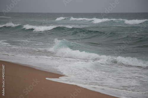 Fototapeta Naklejka Na Ścianę i Meble -  Beautiful coast of the Indian Ocean in cloudy weather.