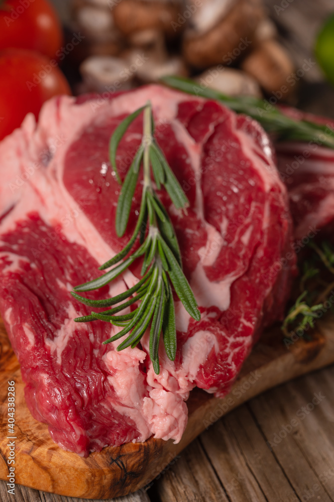 steak, beef, meat, board, butcher, fillet, red, uncooked, food, fresh, raw, pepper, preparation, cooking, rosemary, seasoning, cut, salt, spice, ingredient, eye, protein, rib, sirloin, space, barbecue
