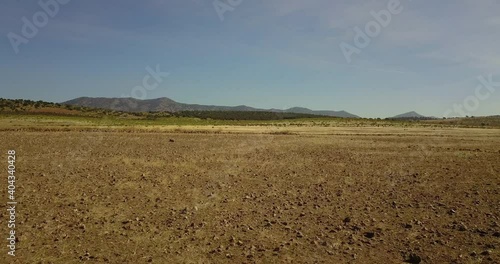 Overflight over a very barren and dry landscape in the Extremadura in southern Spain