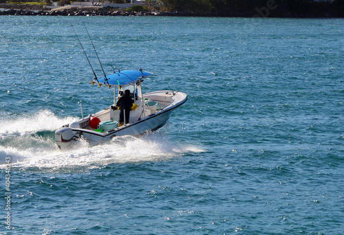 Fishing boat speeding on Government Cut off of Miami Beach,Florida 