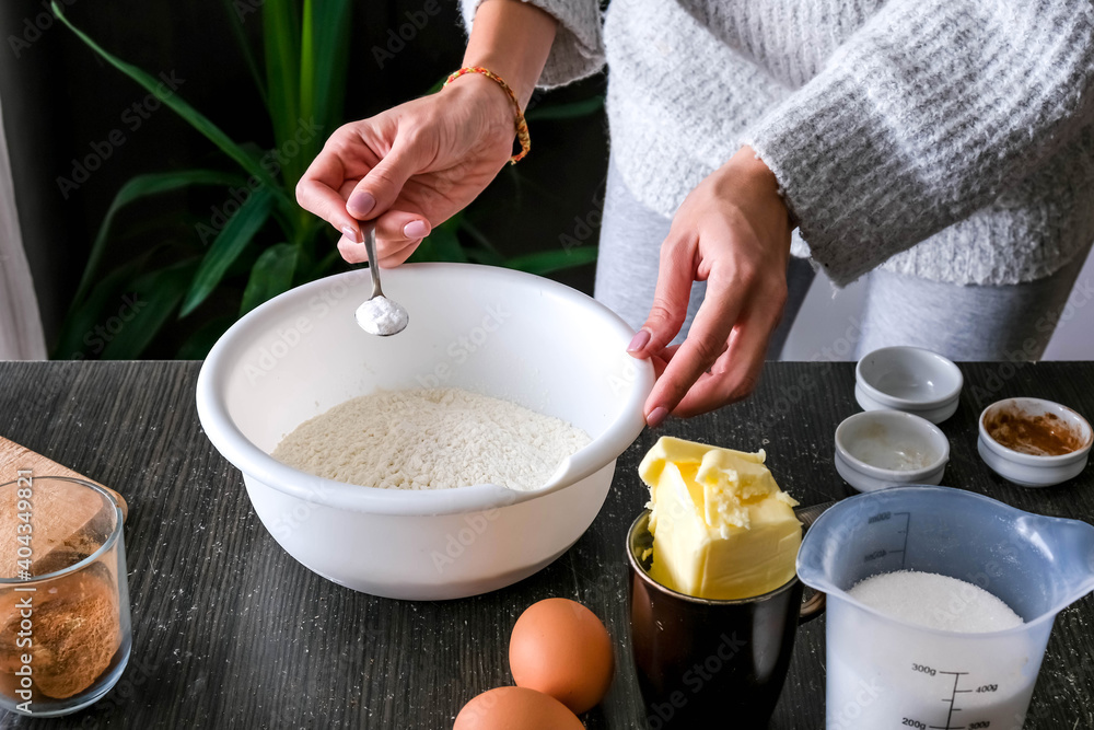 female hands making dough for the cake. making a cake at home, handmade, homemade. recipe, step by step