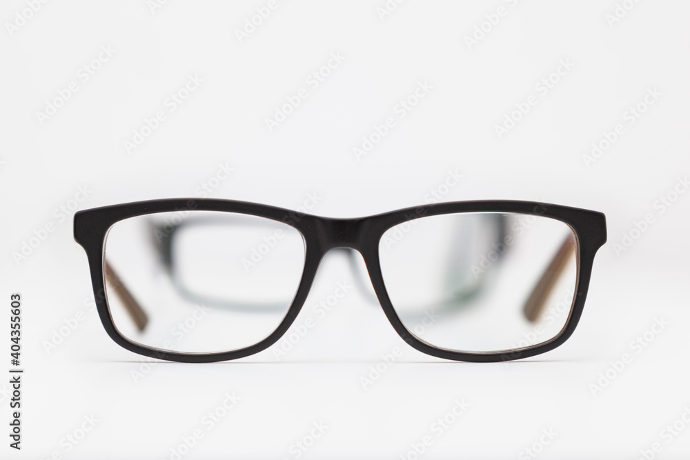 Two pairs of eyeglasses on a white background Two pairs of eyeglasses on a white background