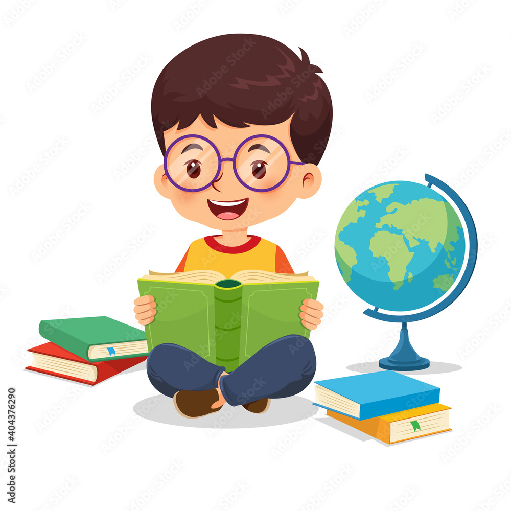 Little boy wearing glasses sitting on the floor happy reading book Little boy wearing glasses sitting on the floor happy reading book