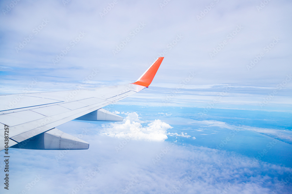 Airplane wing On the blue sky Airplane wing On the blue sky