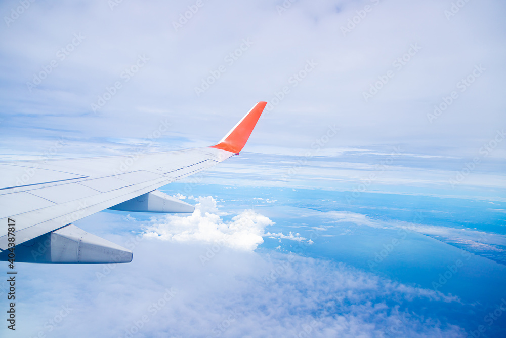 Airplane wing On the blue sky Airplane wing On the blue sky