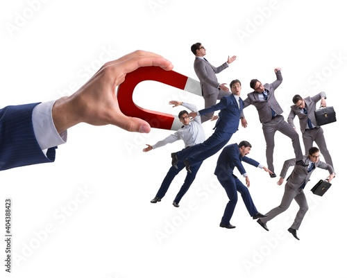 Fotografie Businessman in recruitment concept with horseshoe magnet