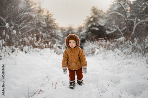 child playing with snow