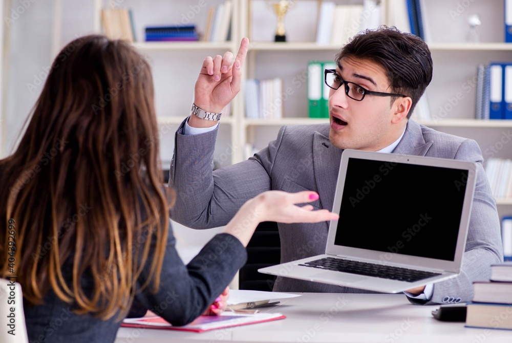 Business meeting between businessman and businesswoman Business meeting between businessman and businesswoman