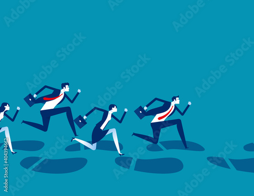A group of business people running along huge footprints