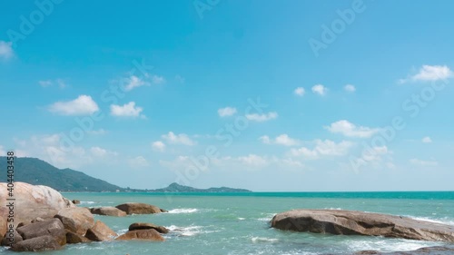 Wallpaper Mural blue sky and white sand beach in a summer day. seascape timelapse footage, wispy clouds on soft blue background, sunlight shine on white calm ocean waves. travel to tropical sea on holiday.  Torontodigital.ca