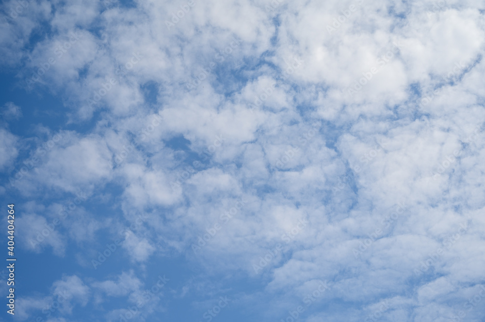 Blue sky with white clouds in daylight for background. Blue sky with white clouds in daylight for background.