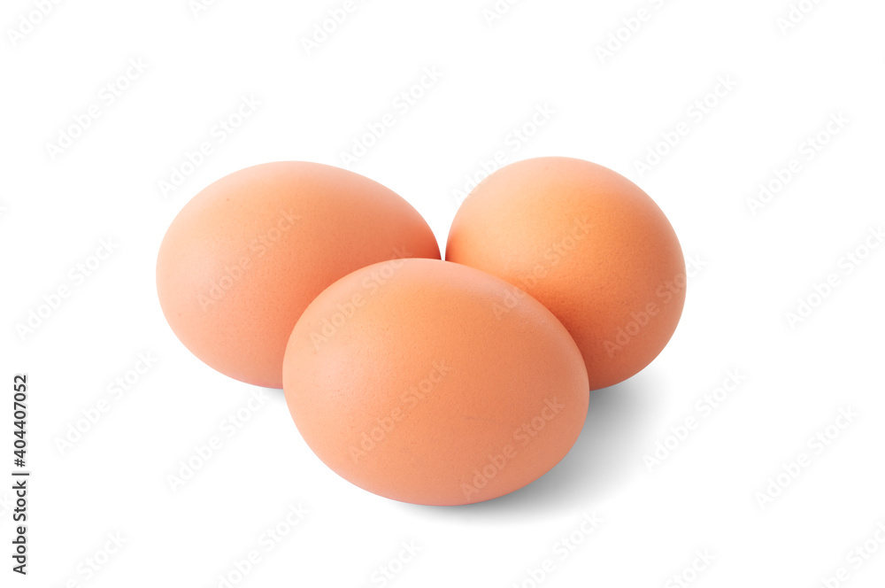 Three fresh brown eggs isolated on white background. With clipping path. Closeup and macro. Three fresh brown eggs isolated on white background. With clipping path. Closeup and macro.