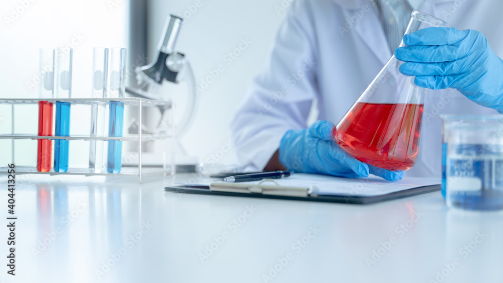 Scientists work in lab, Researcher conduct experiment analyzing drug treatment.. Scientists work in lab, Researcher conduct experiment analyzing drug treatment..