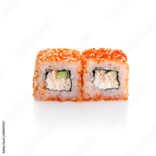 Sushi rolls california with snow crab, cream cheese, cucumber, sesame seeds and masago caviar isolated on white background with reflection. Japanese oriental cuisine.