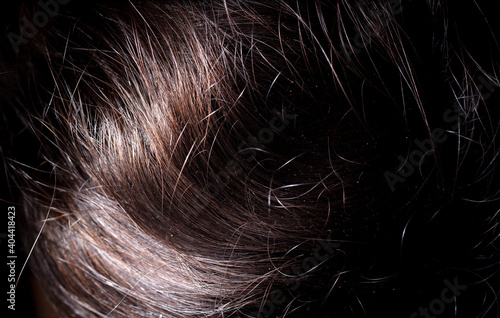 Dark hair as an abstract background.