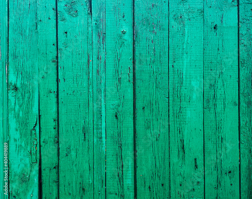 Green boards on the fence as an abstract