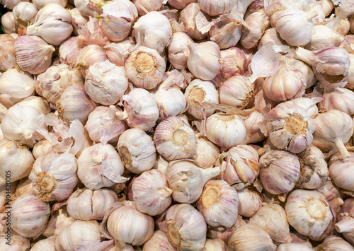 Garlic in the supermarket as a background.