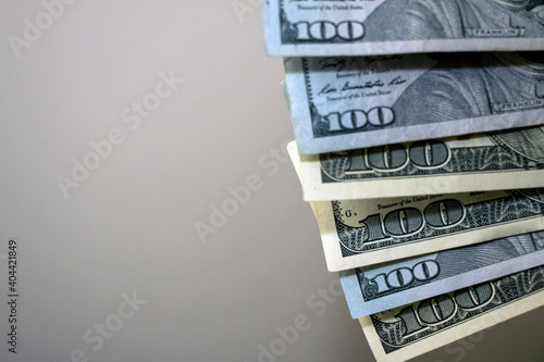 Fanned edges of six hundred bills