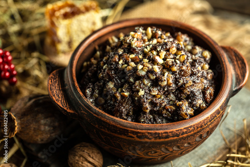 Kutya. Traditional Christmas slavic dish kutia porridge made of wheat grains, poppy seed, nuts, raisins and honey. Eastern Orthodox Christians in Ukraine, Belarus and Russia photo