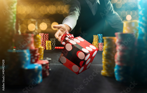 Man gambling at the craps table at the casino © Netfalls