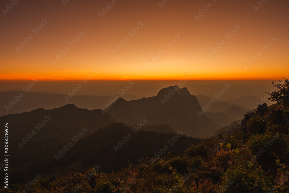 Mountains under mist in the Evening Setting sun beautiful Mountains from Doi Luang Chiang Dao Chiang Mai In Thailand Natural forest Mountains under mist in the Evening Setting sun beautiful Mountains from Doi Luang Chiang Dao Chiang Mai In Thailand Natural forest