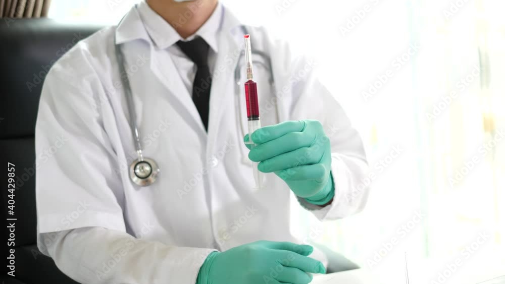 Medical Healthcare Research and Development Concept. doctor holding medical syringe and stethoscope, Medical Healthcare Research and Development Concept. doctor holding medical syringe and stethoscope,