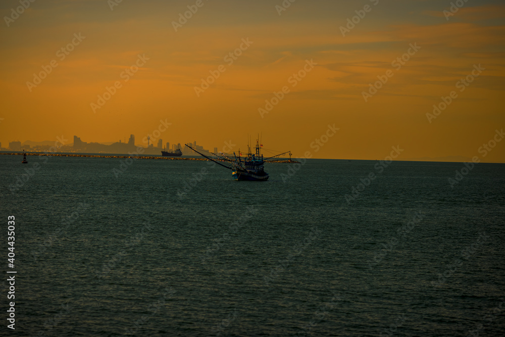 The background of the bridge stretches into the sea, with twilight light in the morning, beautiful colors, sky wallpaper and refreshing surroundings.