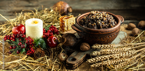 Kutia. Traditional ukrainian Christmas ceremonial grain dish with honey, raisins and poppy seeds. Christmas sweet dishes in Ukraine, Belarus and Poland. banner, menu, recipe photo