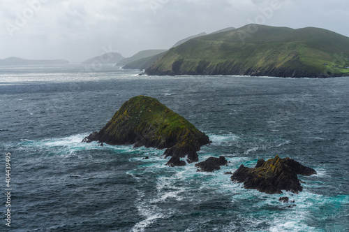 Atlantic ocean, isles, cliffs, mountains and beautiful cloudy sky, this is the Dingle Peninsula on Ireland’s Wild Atlantic Way, southwest Atlantic coast