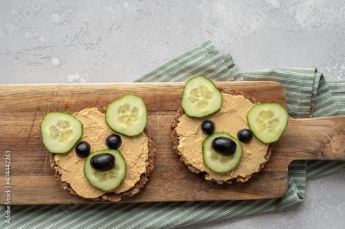 Funny bear toast with cucumber and hummus toasts