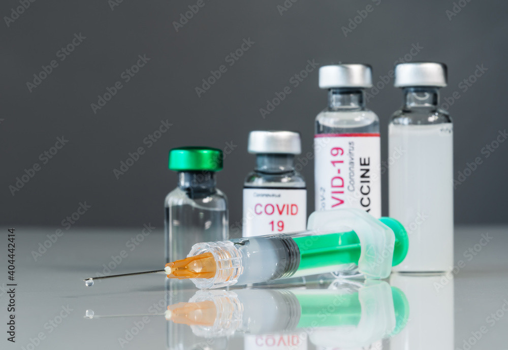 syringe injection and coronavirus covid-19 vaccine bottles syringe injection and coronavirus covid-19 vaccine bottles