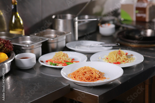 Food, cooked Spaghetti on disc ready to serve to customer, italian spaghetti pasta with tomato sauce