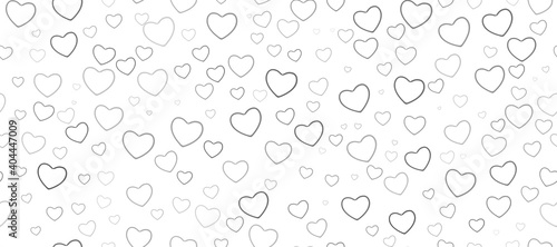 Seamless pattern of black hearts on a white background. Love symbol ornament minimalistic symmetrical romantic composition.