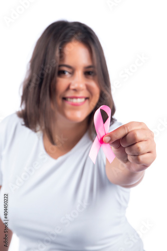 Caucasian girl holding breast cancer ribbon