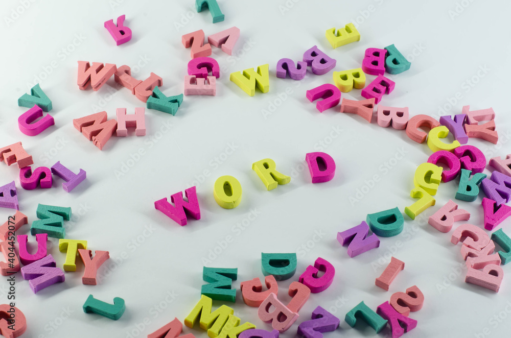 Letters on a white surface. Word among letters. Letter. Letters on a white surface. Word among letters. Letter.