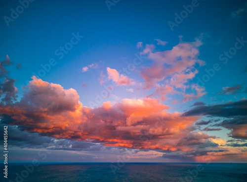 Red clouds over the ocean at sunset